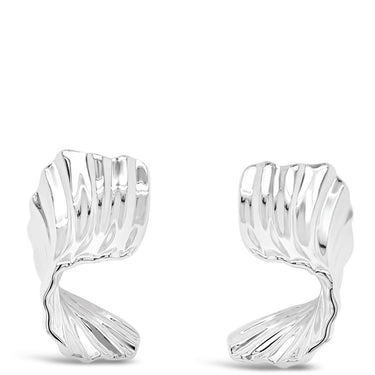 Silver mermaid tail earrings on a white background