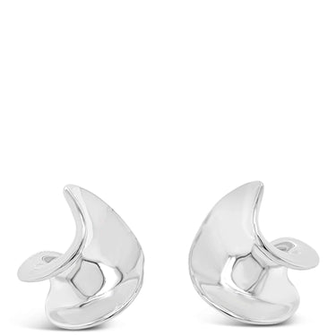 Pair of silver crescent moon earrings on a white background