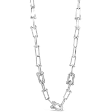 Silver chain necklace with diamond accents on a white background
