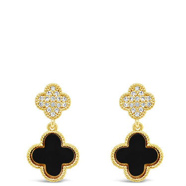 Pair of gold and black earrings on a white background