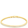 Gold bracelet on a white background