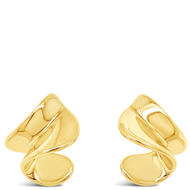 Pair of gold earrings on a white background