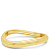 Gold bangle on a white background