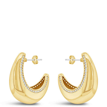 Gold hoop earrings on a white background