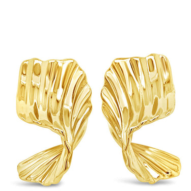 Gold earrings on a white background