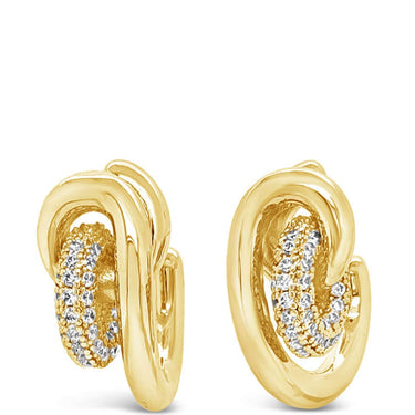 Gold hoop earrings on a white background