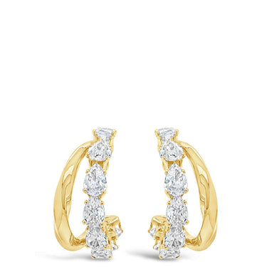 Gold hoop earrings with small diamonds on a white background