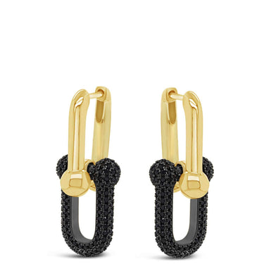 Pair of gold and black hoop earrings on a white background