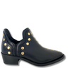 Black boot with gold studs on a white background