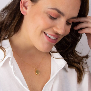 bejeweled-bespoke-gold-oval-locket-worn-on-girl