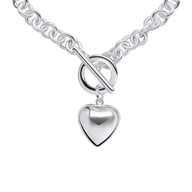 Silver bracelet with a heart-shaped pendant on a white background