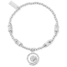 Silver bracelet with a heart charm on a white background