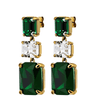 Gold earrings with green and clear gemstones on a white background