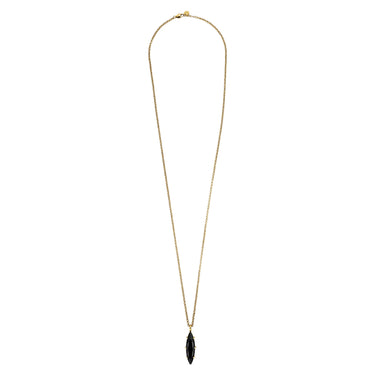 Gold necklace with a black pendant on a white background