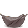 Gray leather handbag with a shoulder strap on a white background