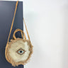 gold-circular-evil-eye-jute-bag