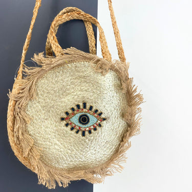 gold-circular-evil-eye-jute-bag