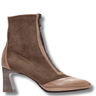 Brown ankle boot with a block heel on a white background