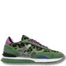Green sneaker with leopard print details on a white background