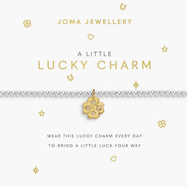 Joma Jewellery Lucky Charm bracelet on a white card with gold text