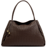 Brown woven handbag on a white background