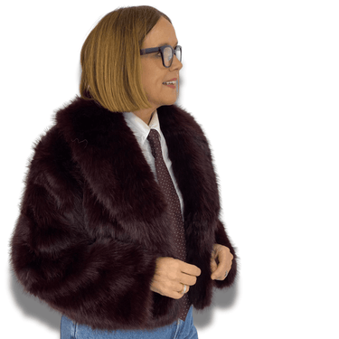 Person wearing a dark brown fur coat on a white background