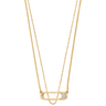Gold necklace with a small pendant on a white background