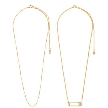 Gold necklace with a small pendant on a white background