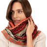 Woman wearing a patterned scarf on a white background