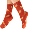 Orange fuzzy socks with owl pattern worn by a person on a white background