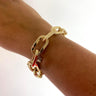 rebecca-diva-gold-half-textured-oval-link-bracelet-silver-clasp