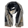 Black and beige houndstooth patterned scarf on a white background