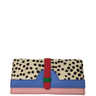 Multicolored clutch bag with polka dot pattern on a white background