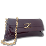 Purple clutch bag with gold chain and clasp on a white background