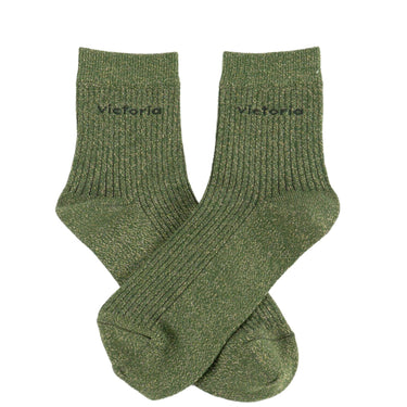 Pair of green socks with 'Victoria' branding on a white background