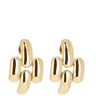 Pair of gold earrings on a white background