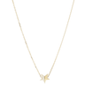 Gold star-shaped pendant necklace on a white background