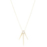 Gold necklace with a central gemstone on a white background