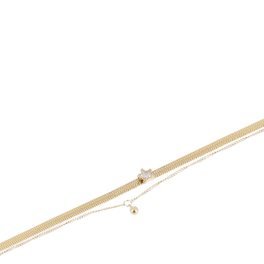 Gold necklace with a small pendant on a white background