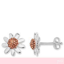 Daisy-shaped earrings with rose gold center on a white background