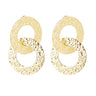 A pair of gold textured drop earrings with interlocking oval and circular links, displayed on a clean white background with a soft reflection below.