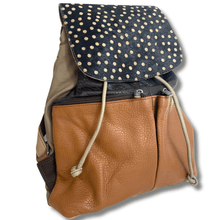 brown leather backpack