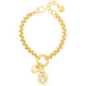 Gold bracelet with heart and round charm on a white background