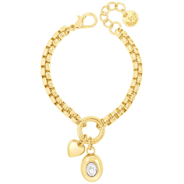Gold bracelet with heart and round charm on a white background