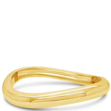 Gold bangle on a white background