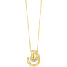 Gold necklace with a crescent moon pendant on a white background