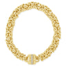 Gold bracelet with intricate design on a white background