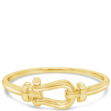 Gold ring with a unique design on a white background