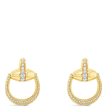 Gold hoop earrings on a white background