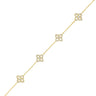 Gold bracelet with diamond-like patterns on a white background